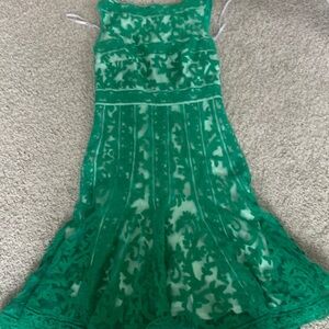 Designer dress beautiful green color. Great shape!